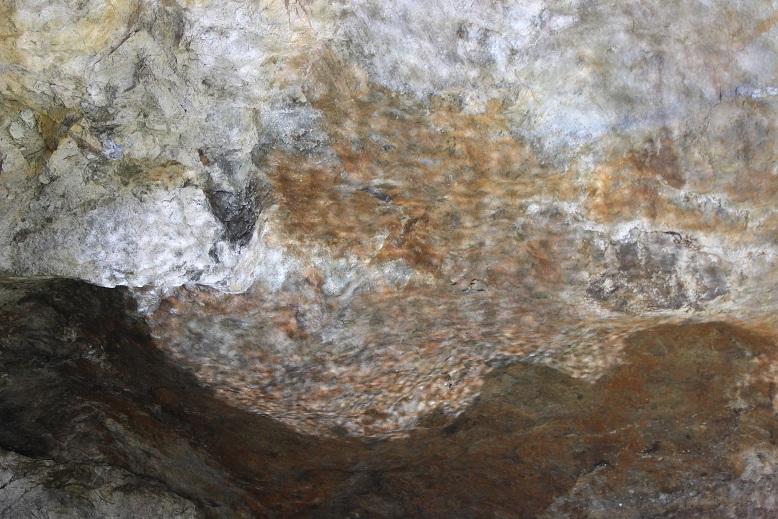 reflection of water on mine ceiling